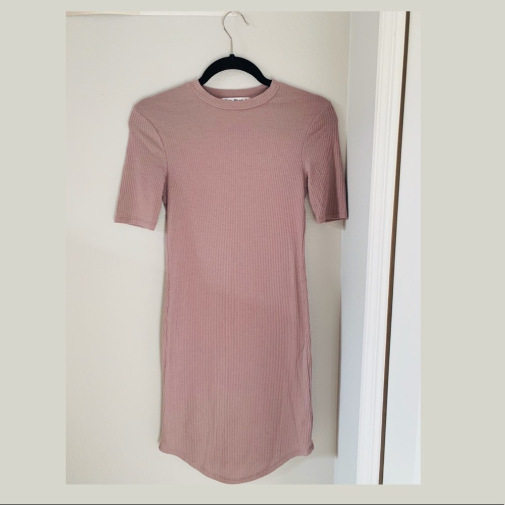 Form-fitting purple dress